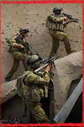 7RAR mechanised Diggers assault a quala during a heavy contact at Sorkh Lez in the Mirabad Valley Afghanistan in May 2009.